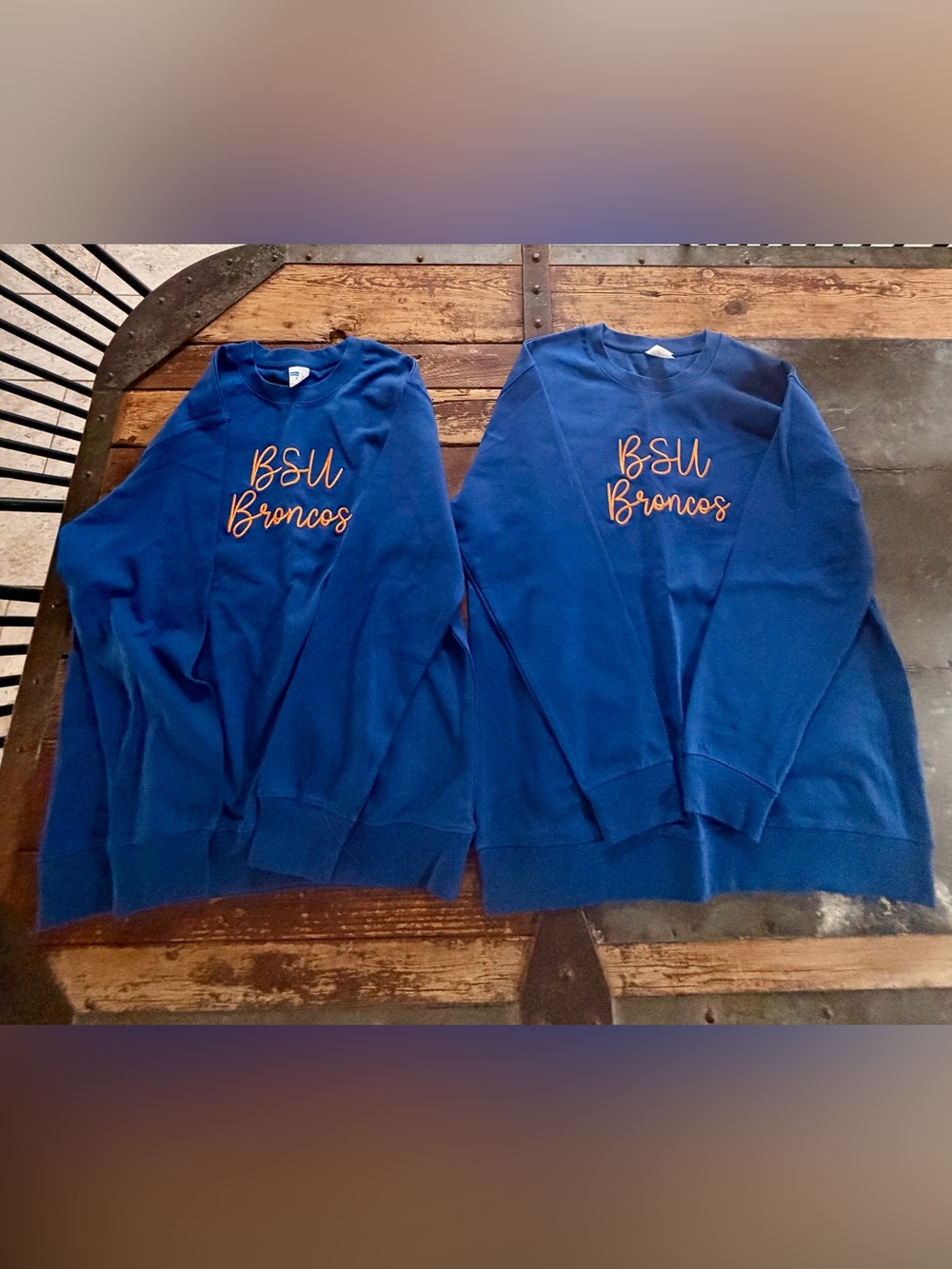 2 NWT BSU Broncos embroidered crew neck sweatshirts. One Med & one Large.